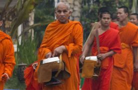 Early Morning Arm Giving In Luang Prabang